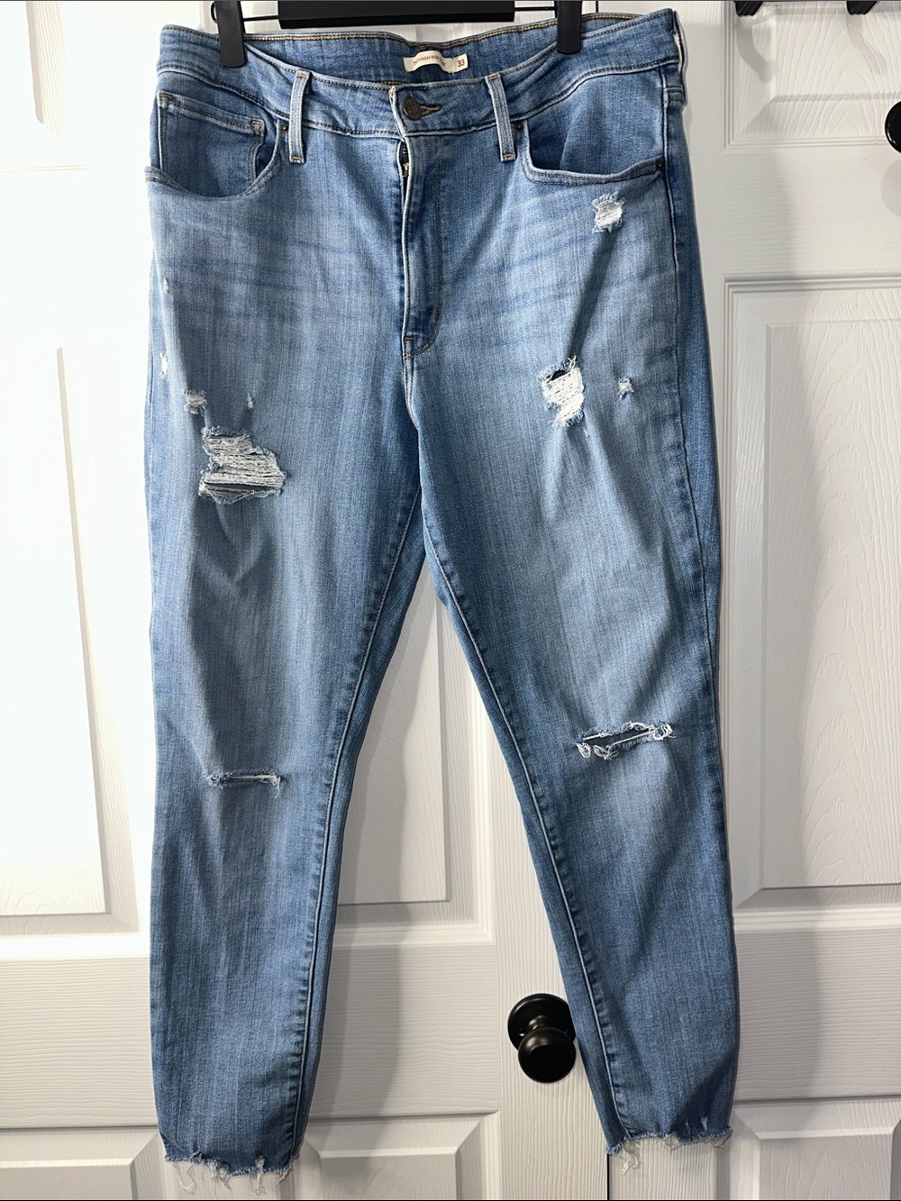 Light Wash Distressed High Rise Skinny Jeans - Women